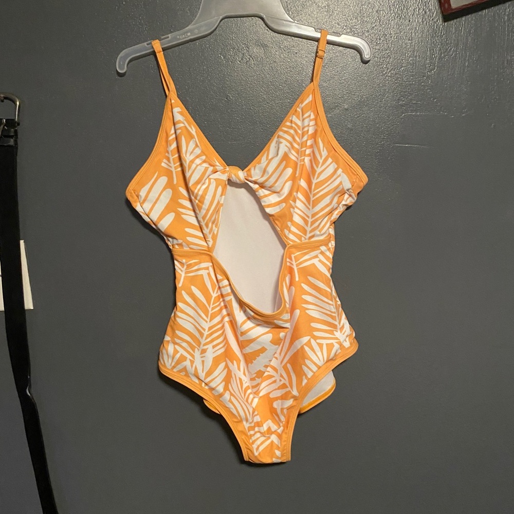 One piece swim suit never worn!